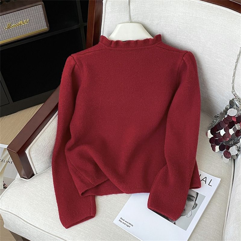 Damer elegant cardigan med feminine flæser og perleknapper Stilla