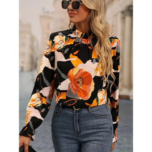 Damebluse med blomsterprint og flæseudskæring i lange ærmer Stilla