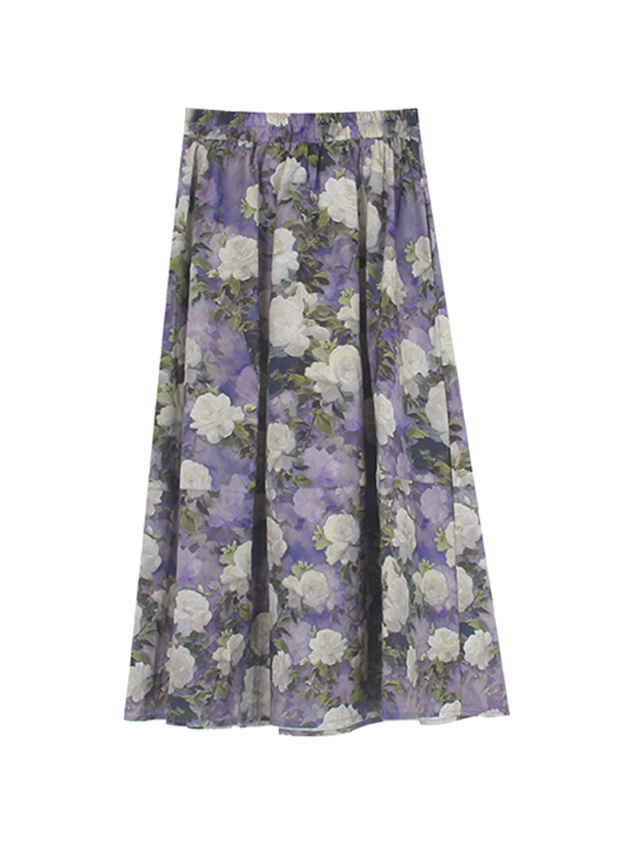 Dame ærmeløs blusesæt i let stof med blomsterdesign og svingende nederdel Stilla