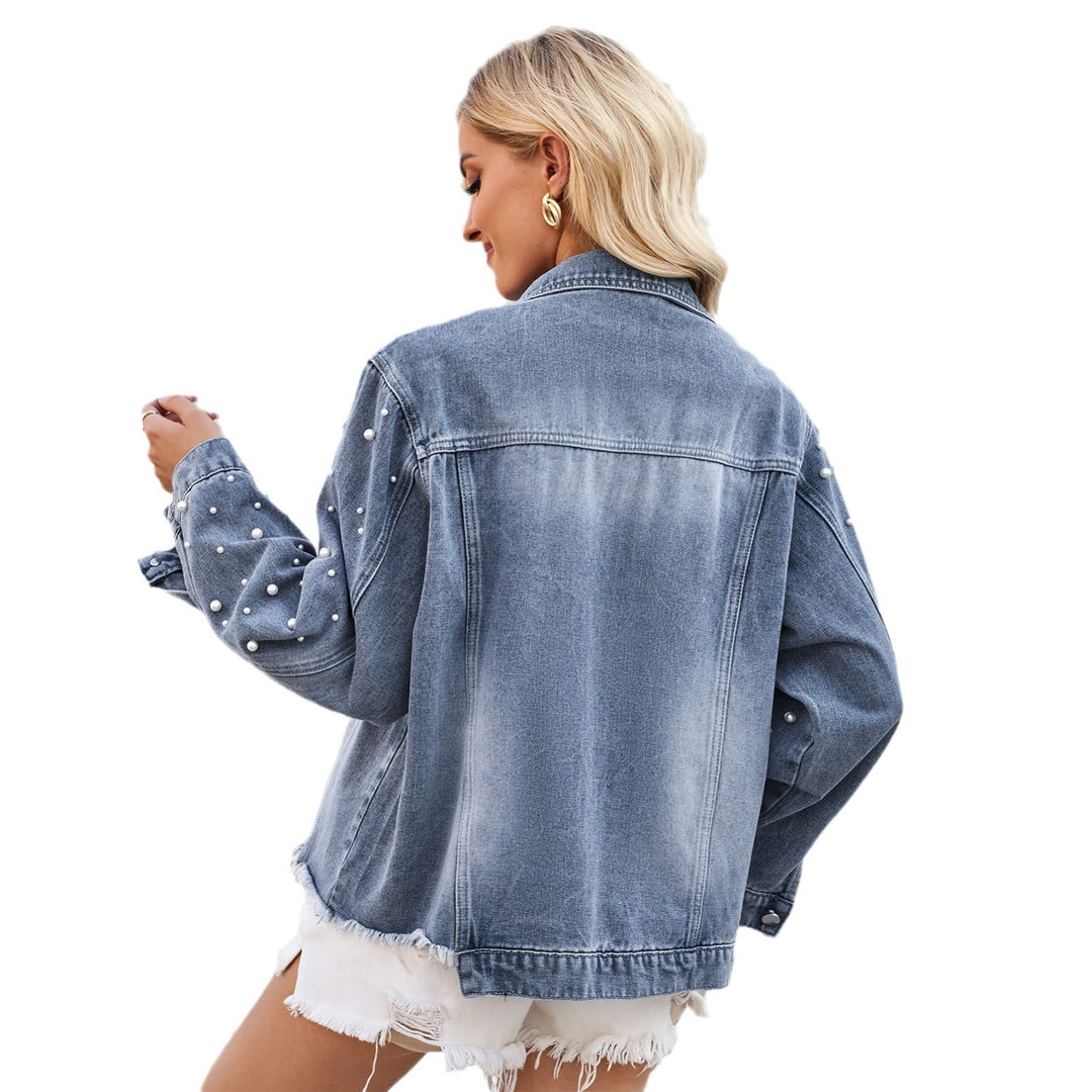 Dame Denimjakke med elegante perledetaljer og afslappet snit Stilla