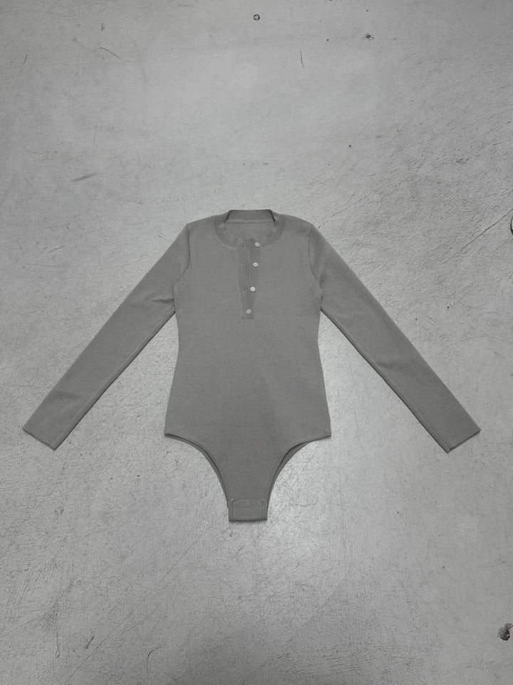 Dame Langærmet Bodysuit med knapdetalje og struktureret materiale Skovae