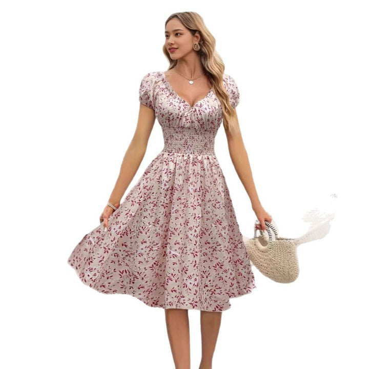Dame Floral Midi-Kjole med elastisk Talje og Puffærmer Stilla