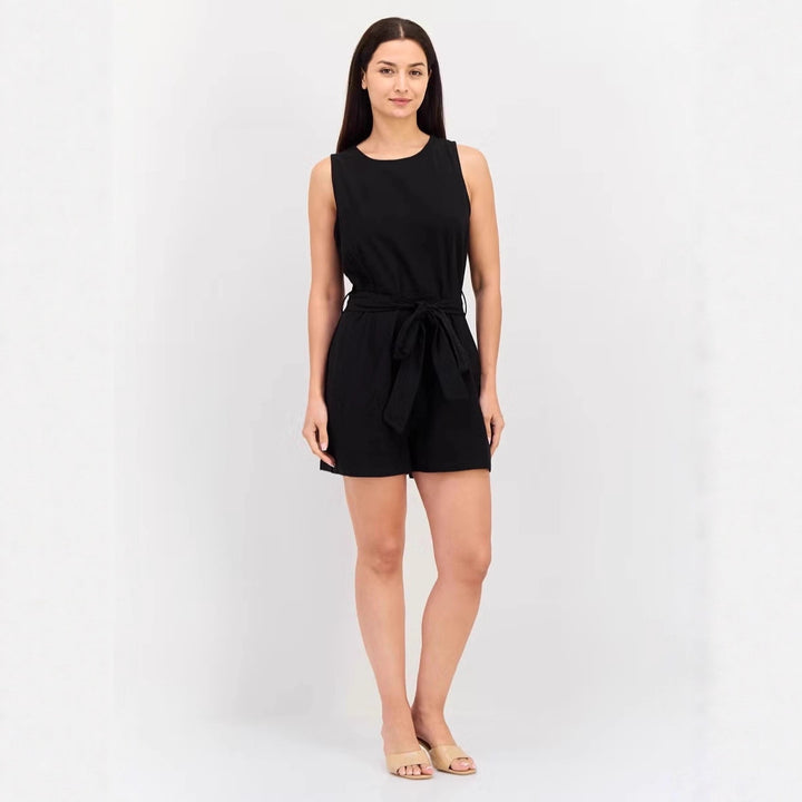 Dame jumpsuit med elegant talje og praktiske lommer Skovae