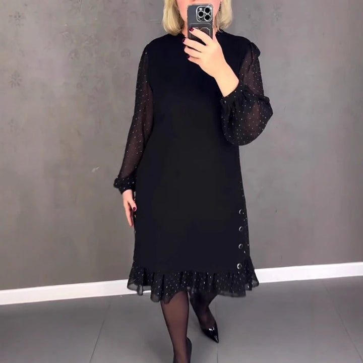 Dame kjole med transparente puffærmer og flæsekant Stilla