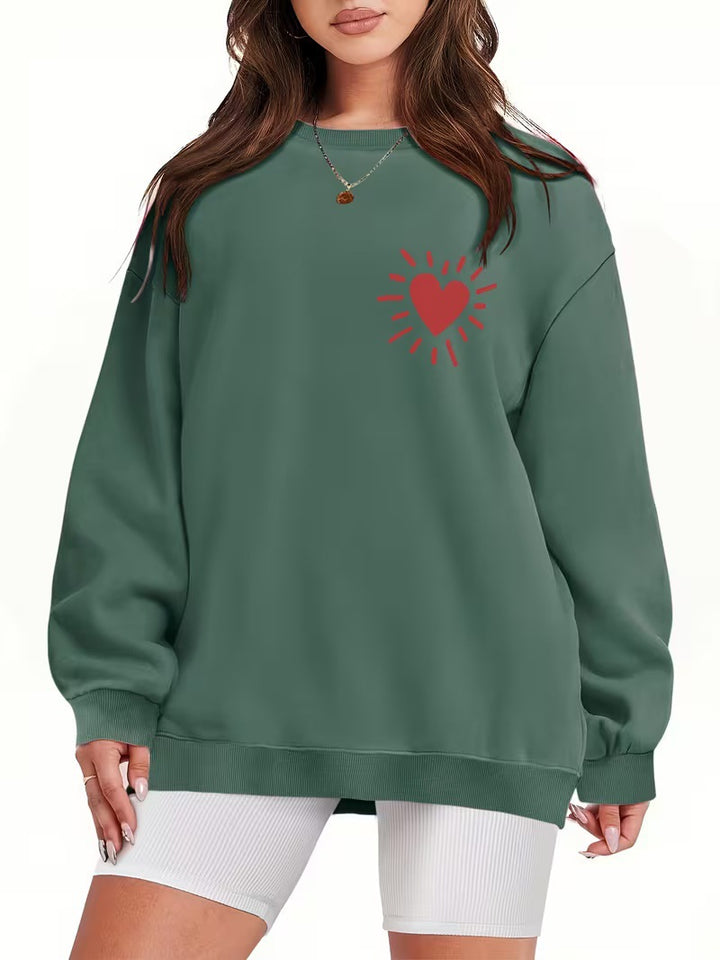 Kvinders sweatshirt med afslappet hjertemotiv og oversized pasform Skovae