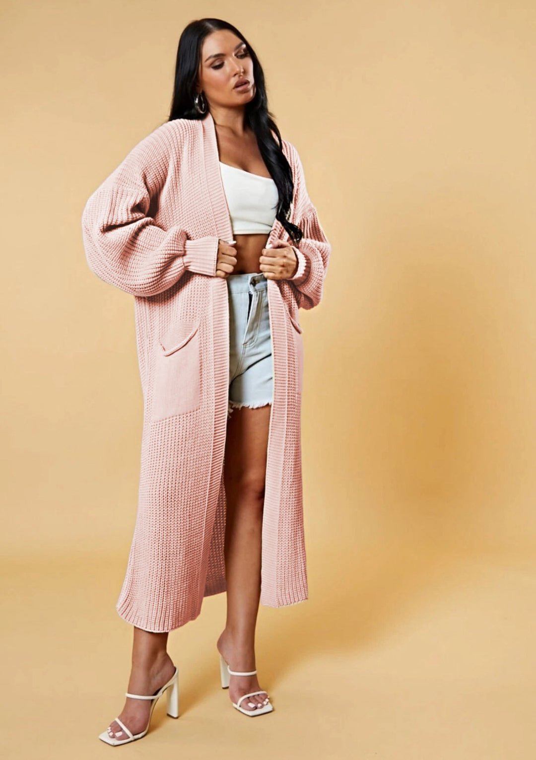 Kvinders lange strikket cardigan med åbent design og praktiske lommer Stilla