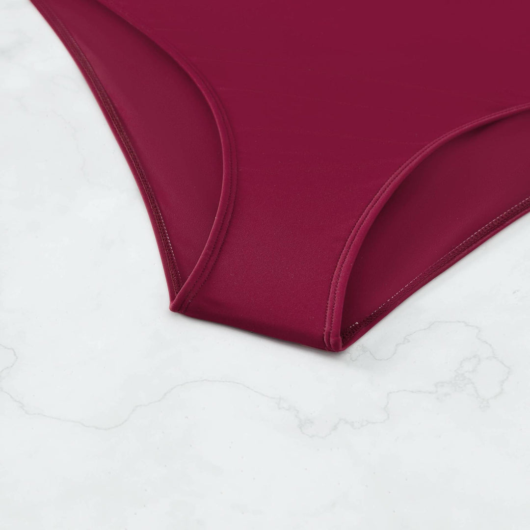 Dame enheder badedragt med asymmetrisk design og stilfulde cut-out-detaljer Stilla