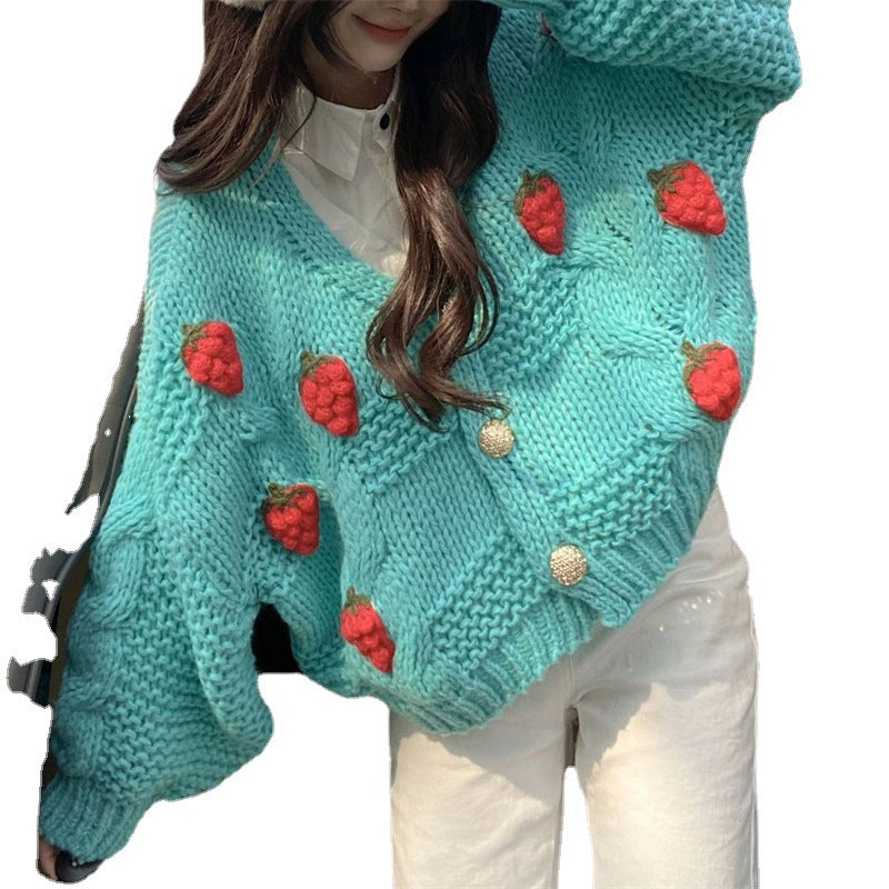 Kvinders chunky strikket cardigan med dejlige blomsterapplikationer og guldknapper Stilla