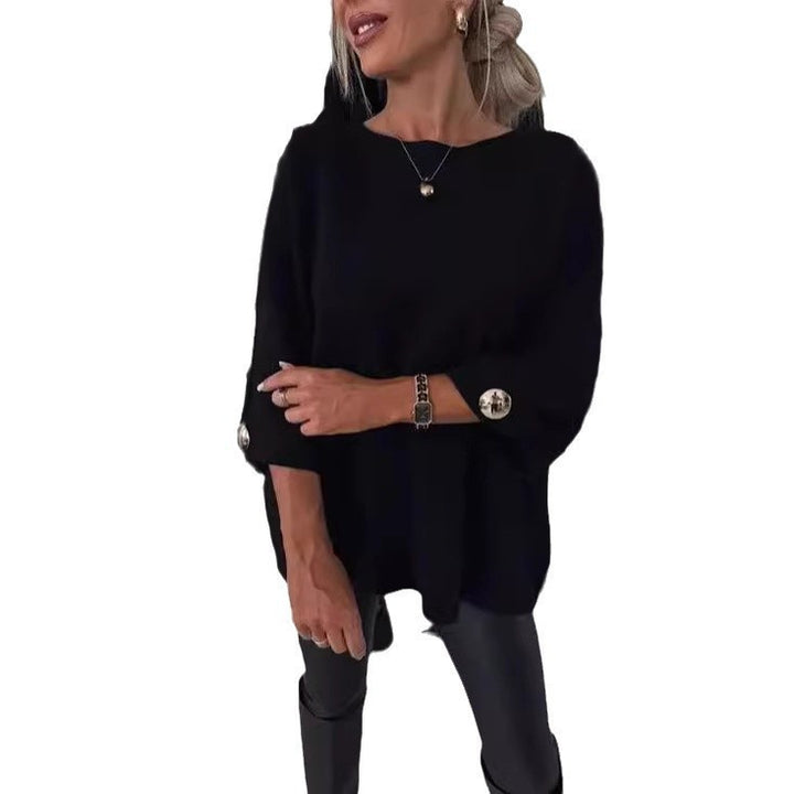 Dame elegant top med dekorative knapper og generøs pasform Stiila