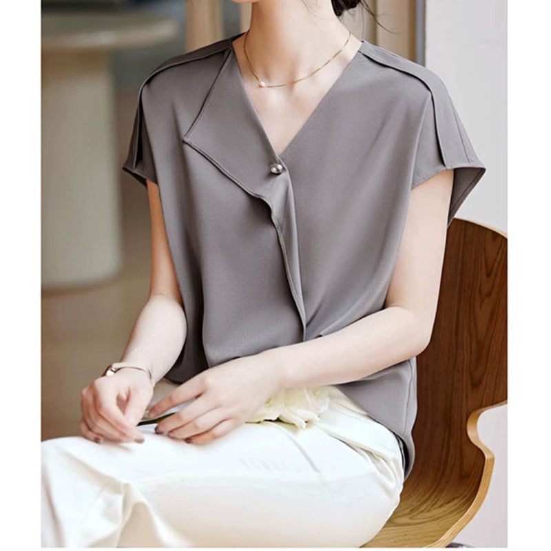 Damebluse med elegant viklook Stilla