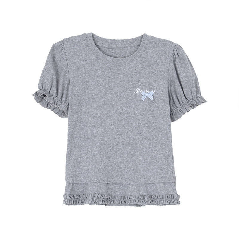 Damer elegant top med flæsedetaljer og charmerende logo Stilla