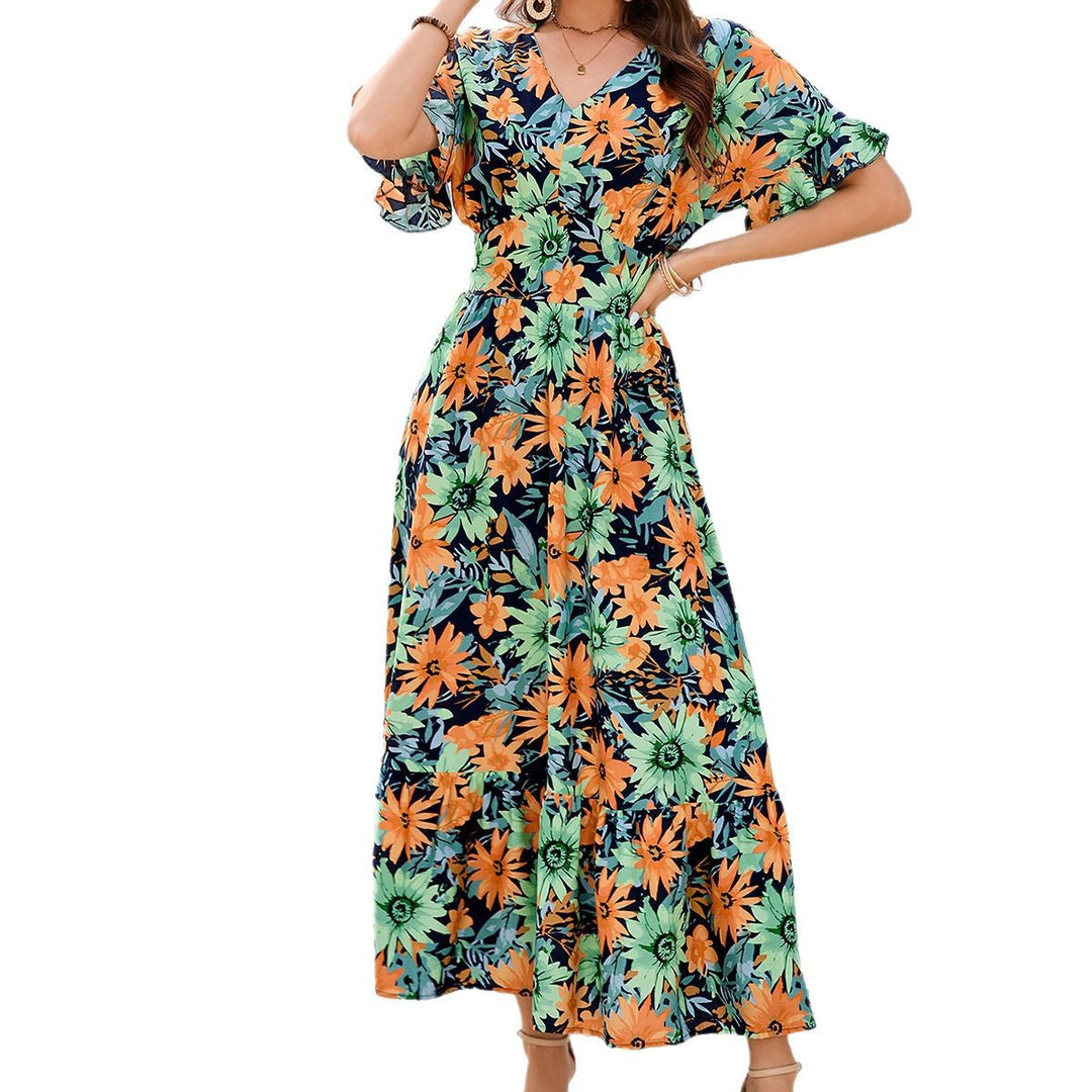 Dame maxikjole med blomstret design og svingende kant Stilla
