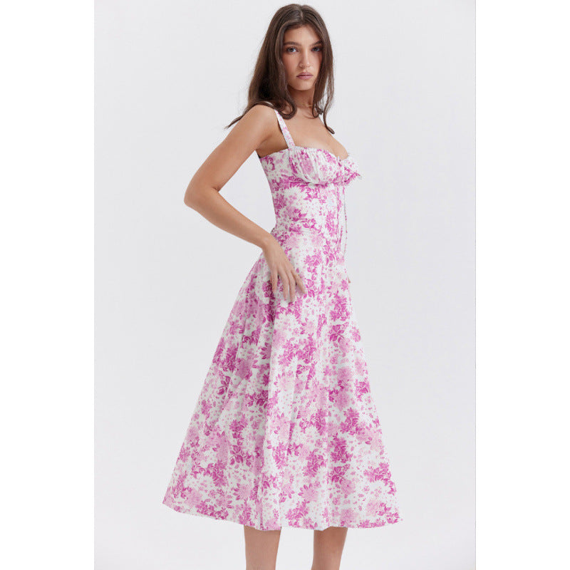 Dame maxikjole med floral design og elegant slids Skovae
