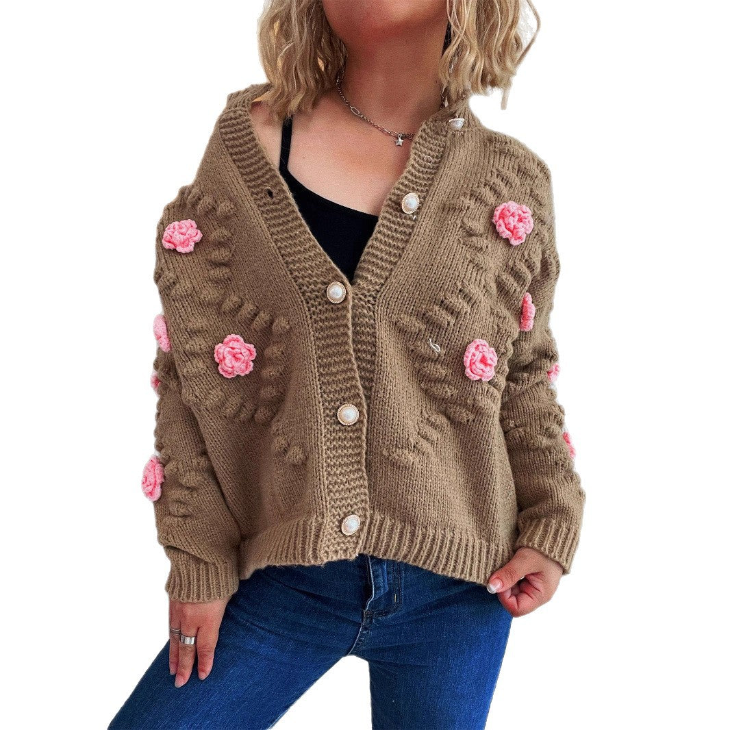Dame cardigan med blomsterapplikationer og perleknapper Stilla