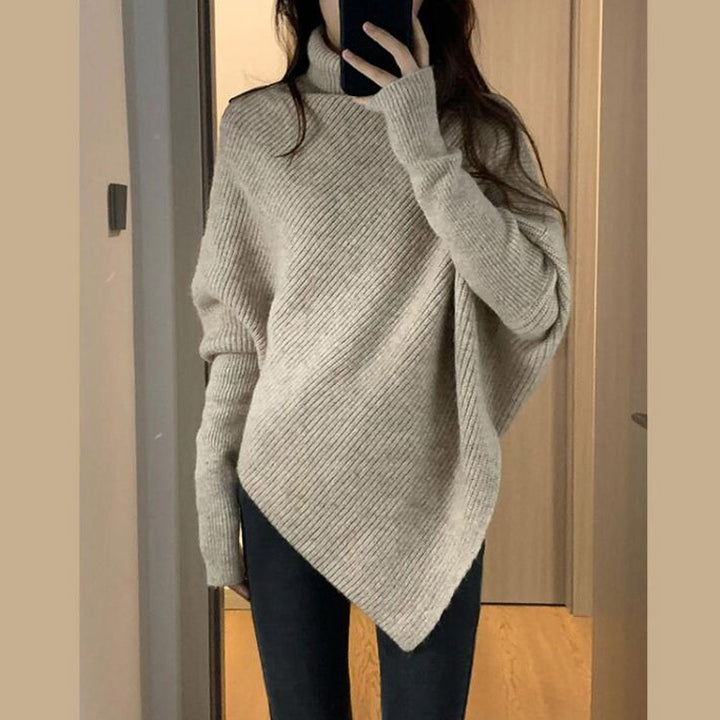 Kvinders oversized strikpullover med asymmetrisk snit og fin ribstruktur Stilla