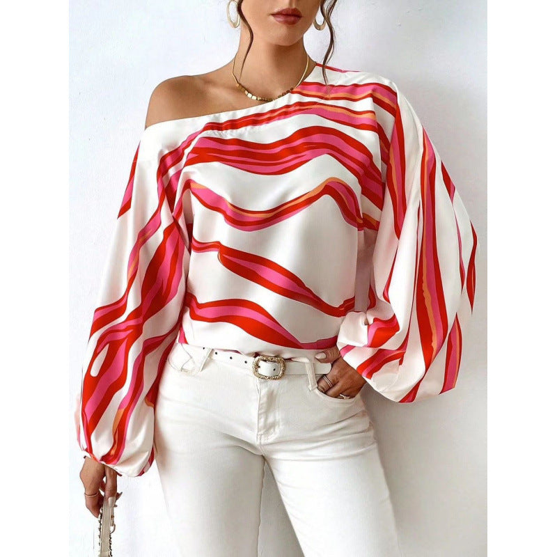 Femme Off-Shoulder Satinbluse med kraftigt stribemønster Stilla