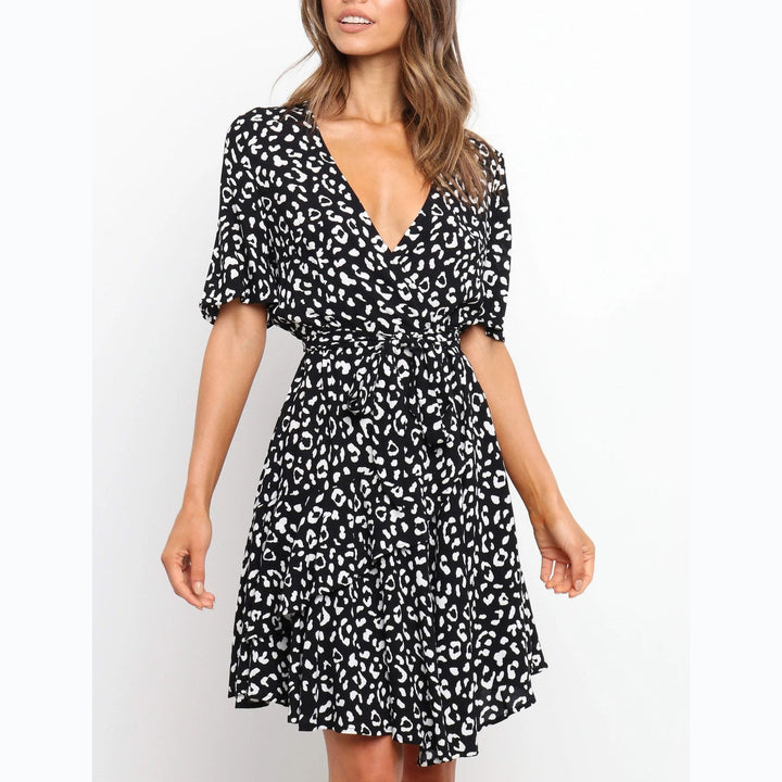 Women's wrap dress with generous ruffle sleeves and beautiful animal print Skovae