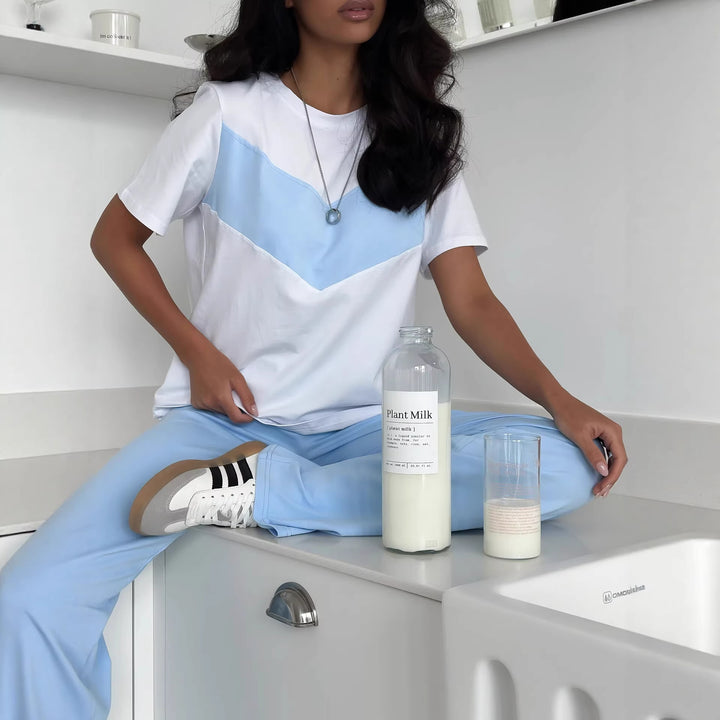 Dame casual T-shirt med moderne farveblok design og let oversized snit