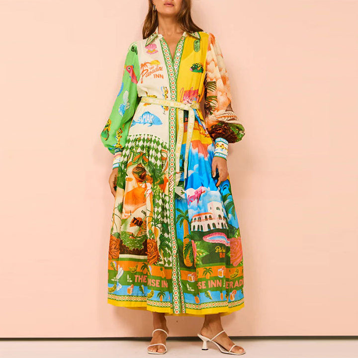 Kvinders lang kaftan kjole med farverig print og elegante pufærmer Stilla