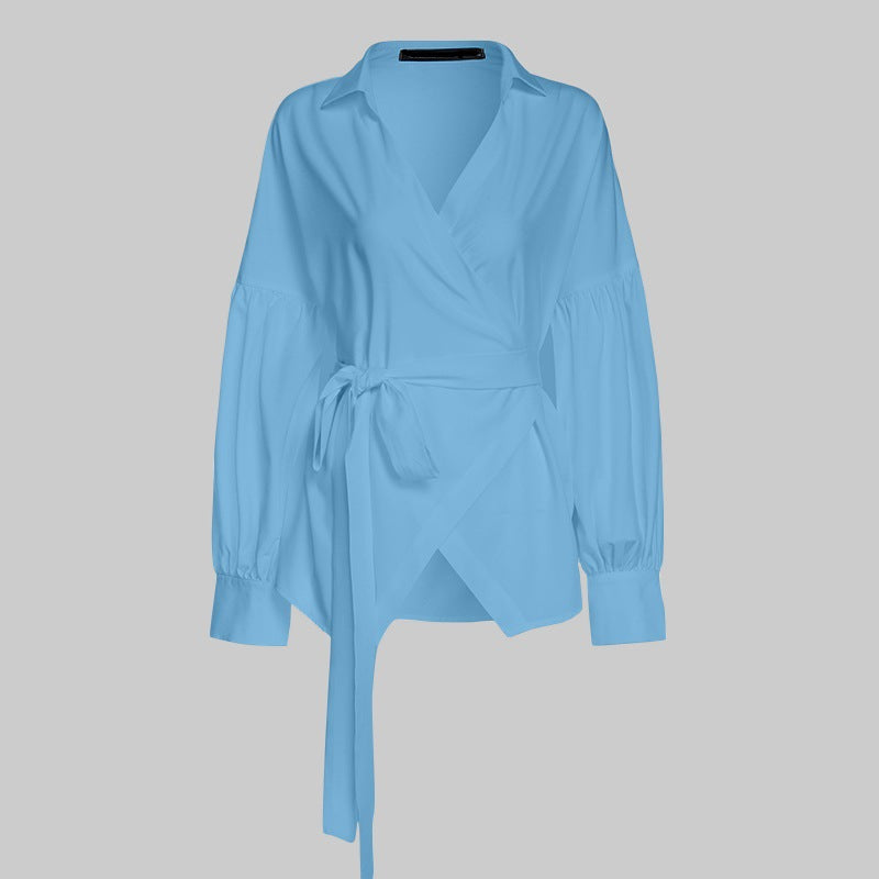 Dame indpakningsbluse med elegante pufærmer og taljebælte Stilla