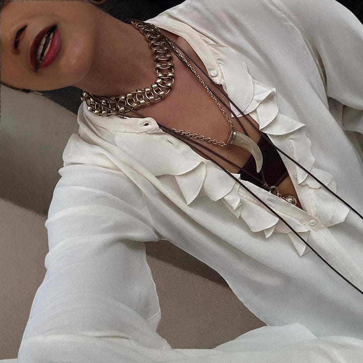 Dame Bluse med flæser og bred pasform samt elegante detaljer Stilla