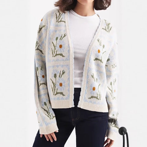 Kvinders cardigan med blomsterdesign og elegante detaljer Stilla