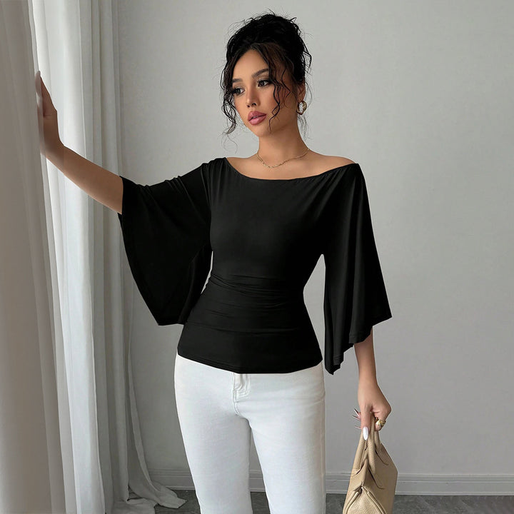 Kvinders elegante off-shoulder top med brede ærmer og figursyet pasform Stilla