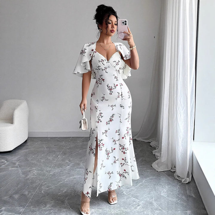 Dame maxikjole med elegante vinger og blomsterdesign Stilla