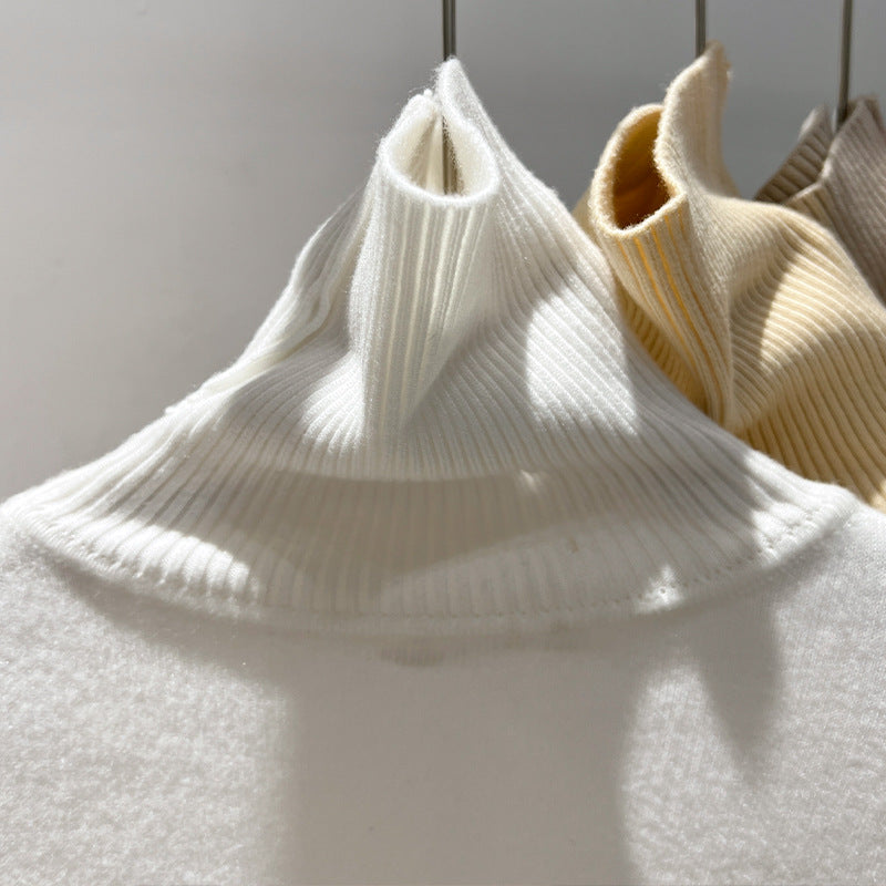 Dame rullekravepullover med blødt inderfutter og trendy design Stilla