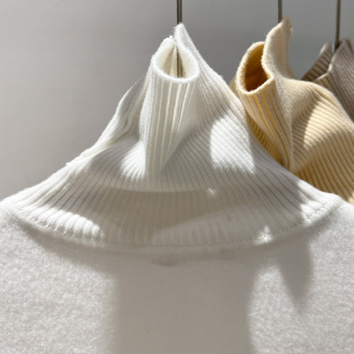 Dame rullekravepullover med blødt inderfutter og trendy design Stilla