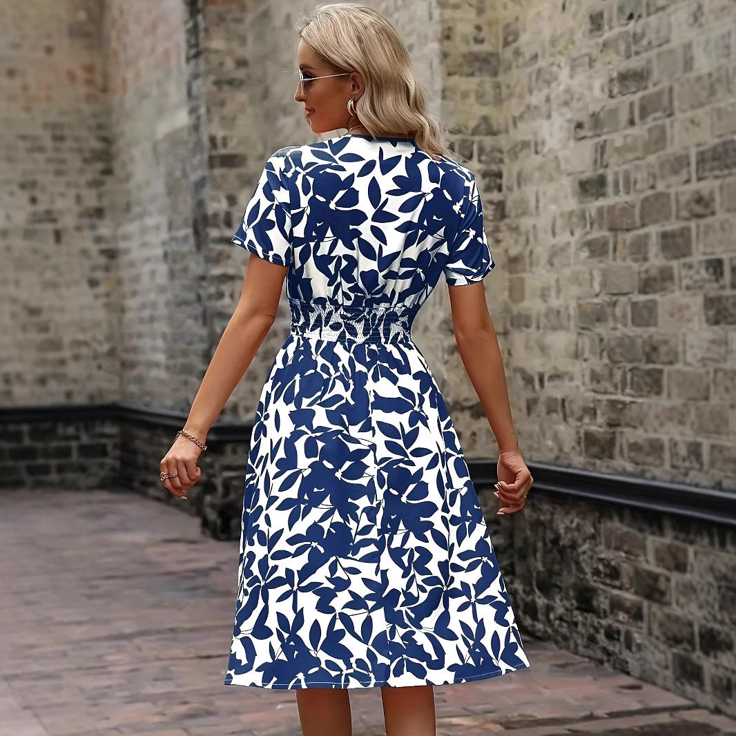 Dame strikkjole med floralt design og elastisk linning Stilla