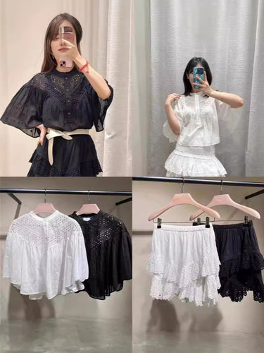 Dame kortærmet bluse med filigran broderimønster og voluminøse ærmer Stilla