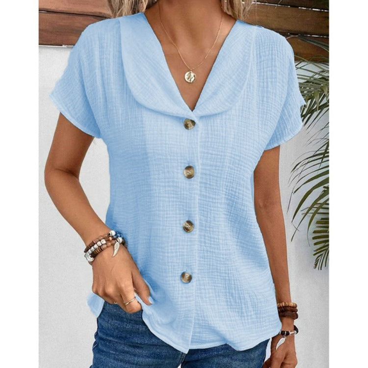 Damebluse med synlige knapper lavet af let stof Stilla