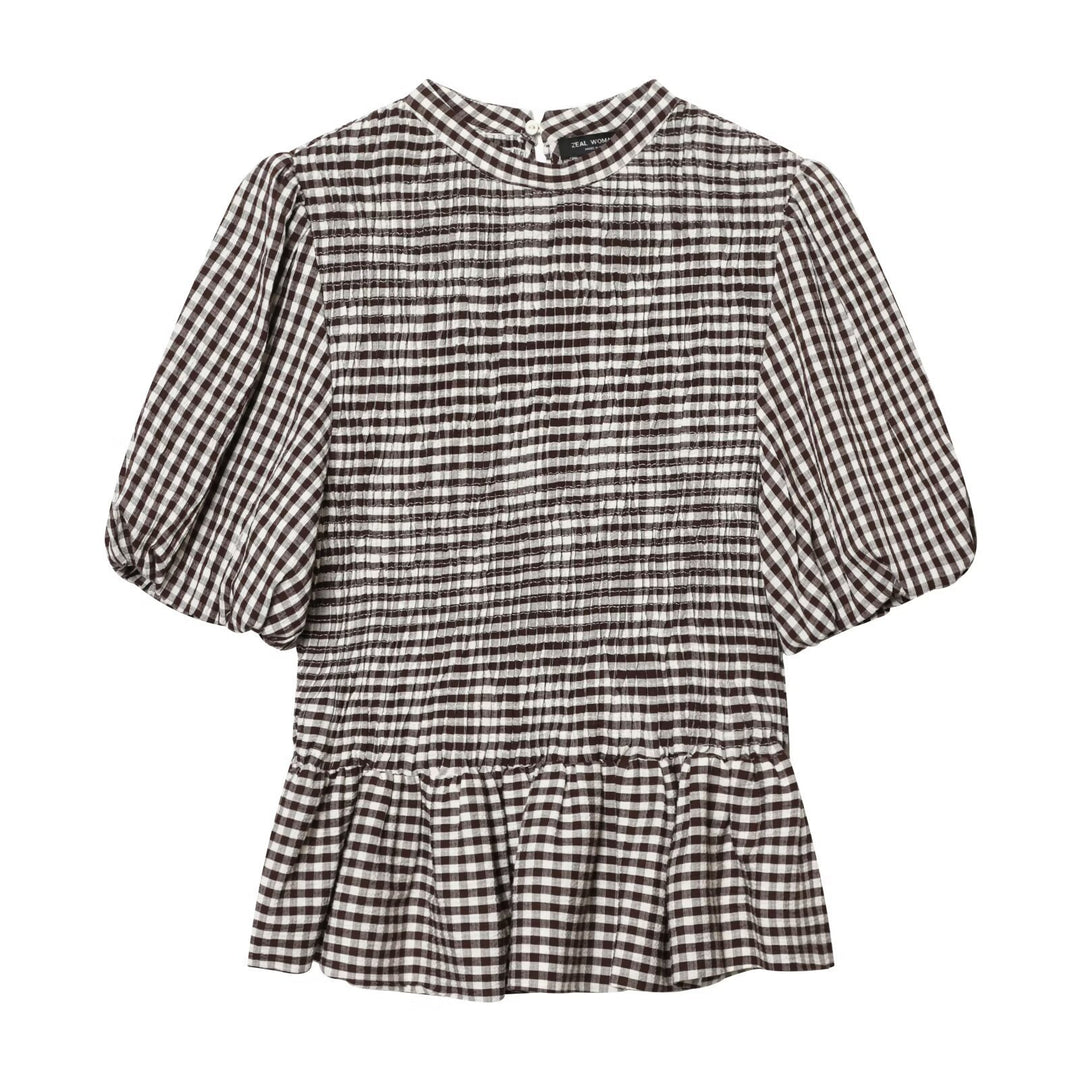 Damebluse med dekorative puffærmer og smidig rynkesilhouette Skovae