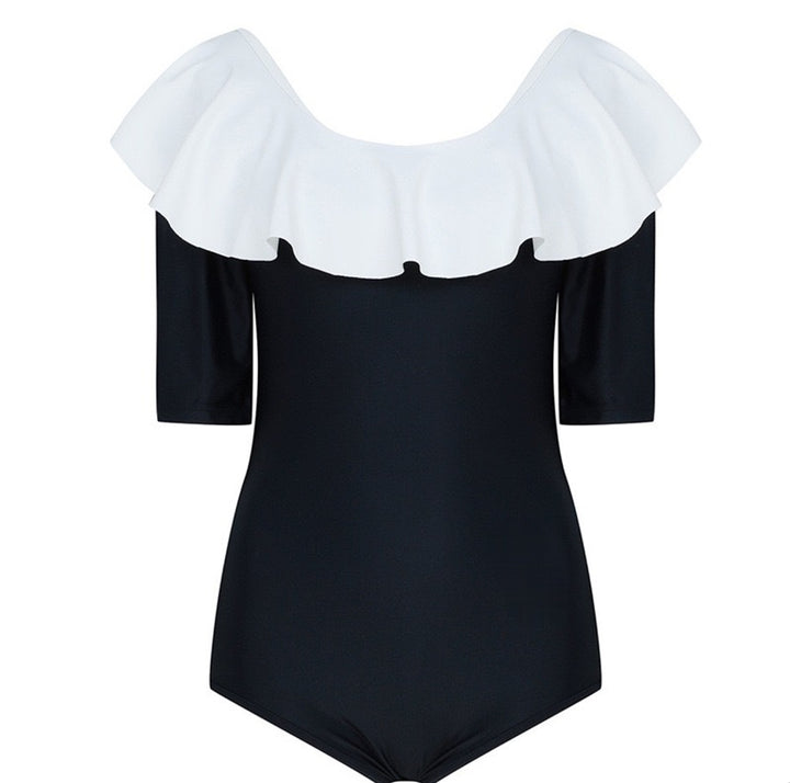 Dame svømmekjole med voluminøs flæsekant og figursyet snit Stilla