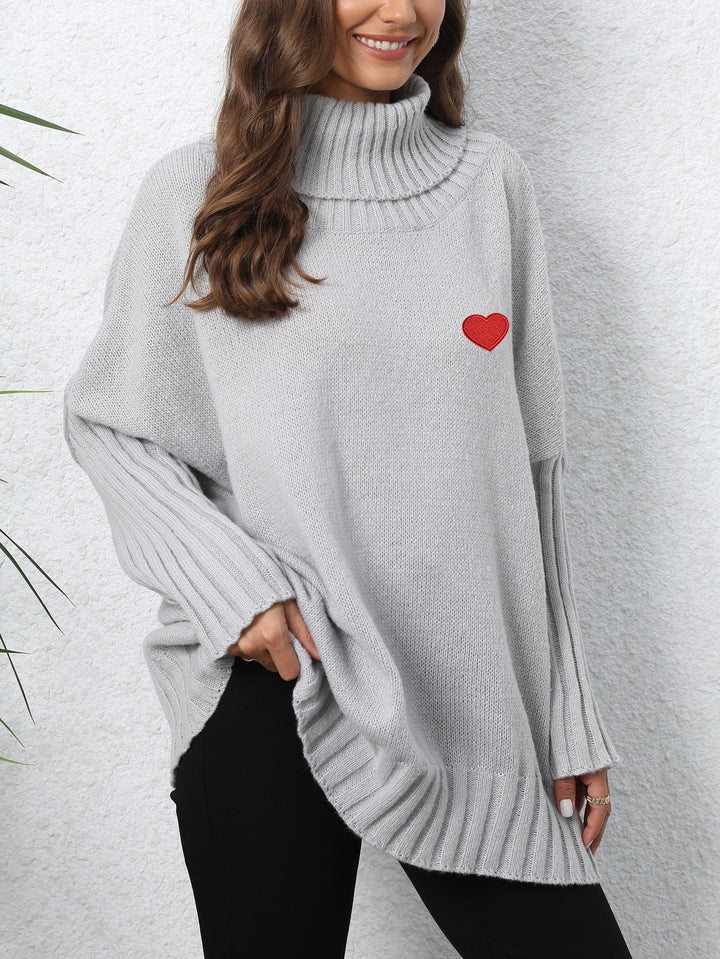 Dame Oversized Turtleneck Sweater med hjerteformet applikation og strikket mønster Stilla