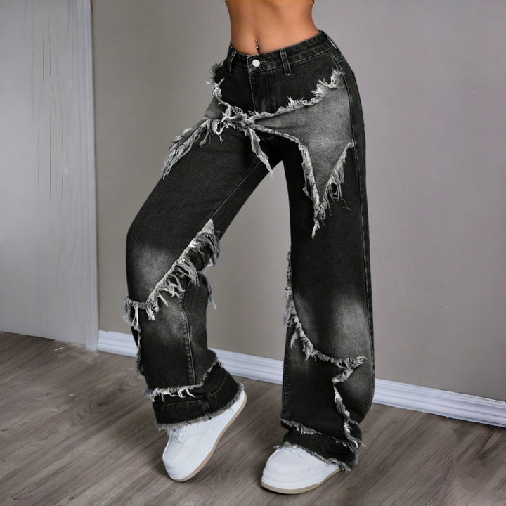 Damebredde jeans i moderne destroyed-look med frynset detaljer Skovae