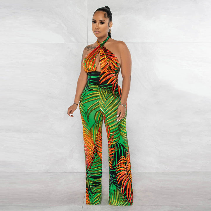 Dame elegant jumpsuit med afslappet halter-design og iøjnefaldende bladmønster Stilla