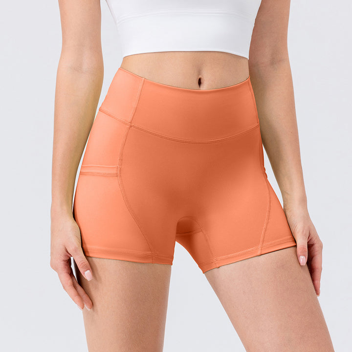 Dame Sporty Høj Talje Shorts med sidelommer og fleksibel pasform Stilla