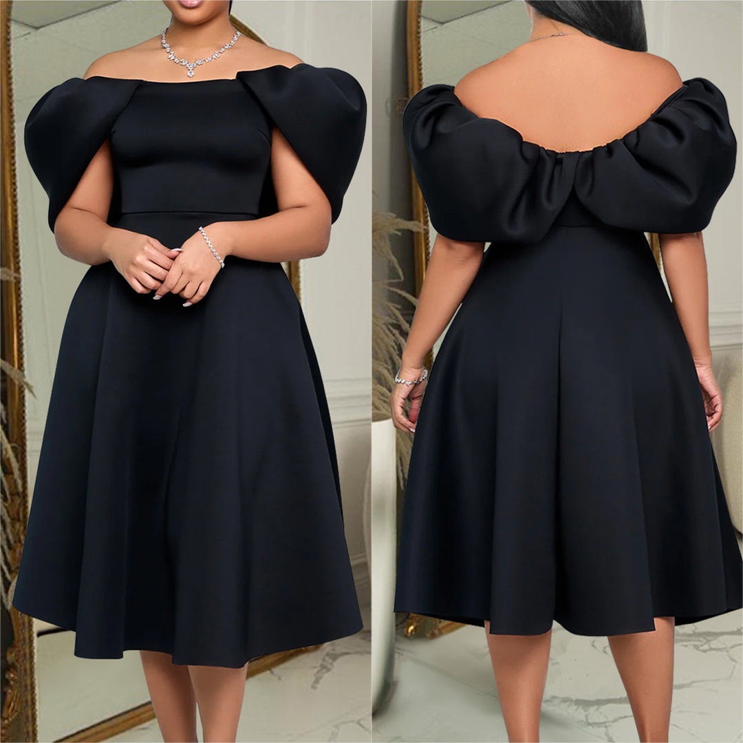 Damer glamourøst midikjole med off-shoulder design og voluminøse puffærmer Stilla