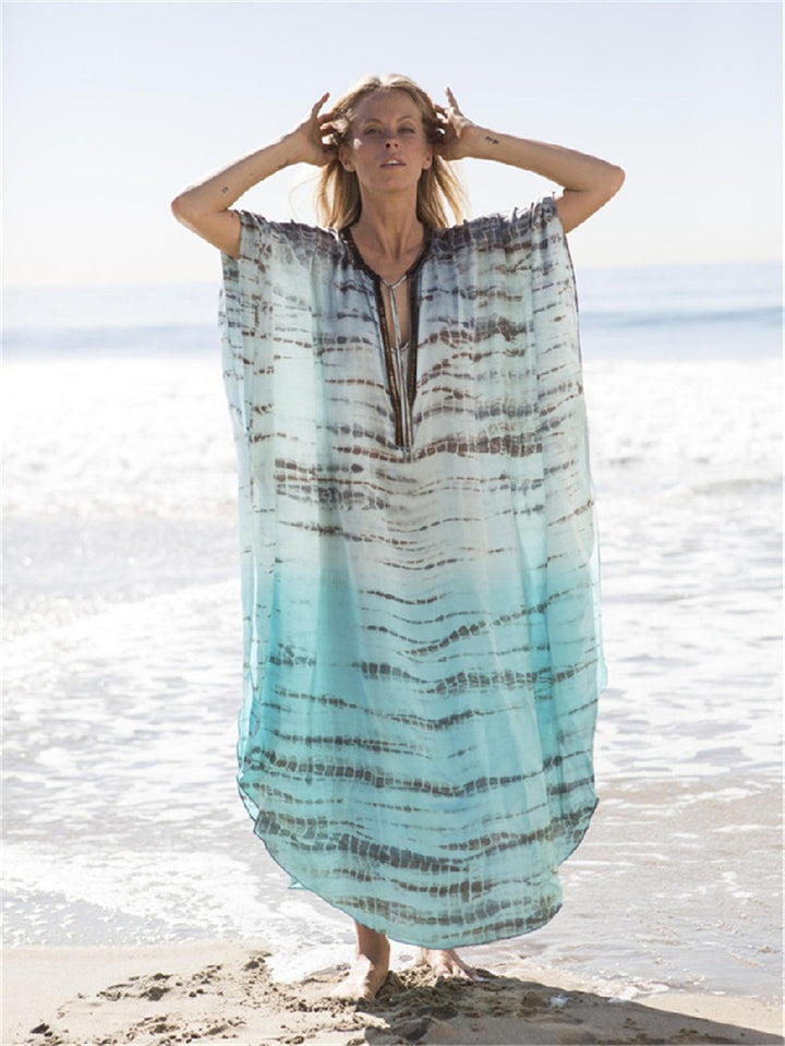 Dame luftig Strandkaftan med elegant bølgemønster og sidelukning Stilla