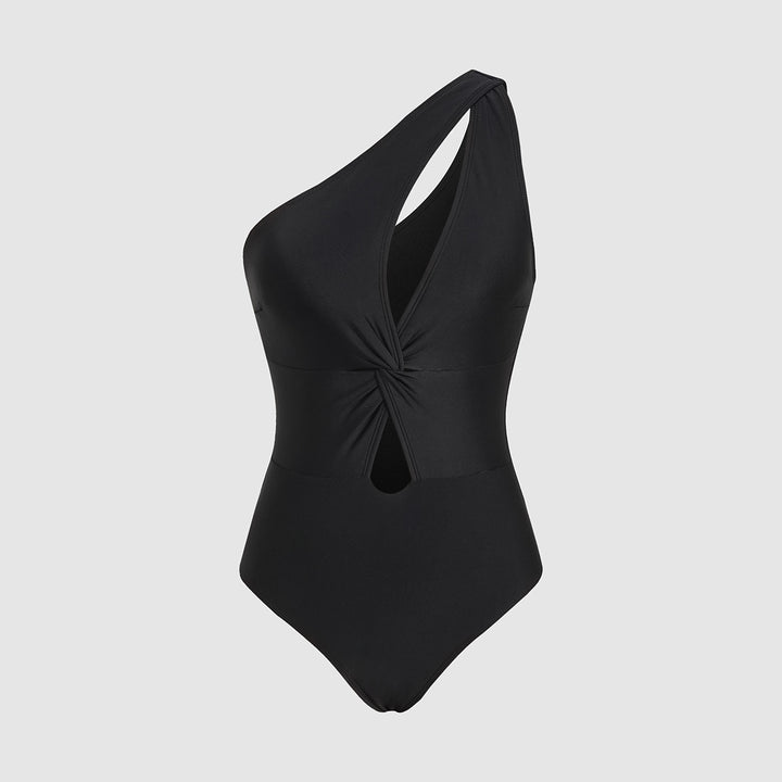 Dame ét-delt badedragt med asymmetrisk design og moderne cut-out Stilla