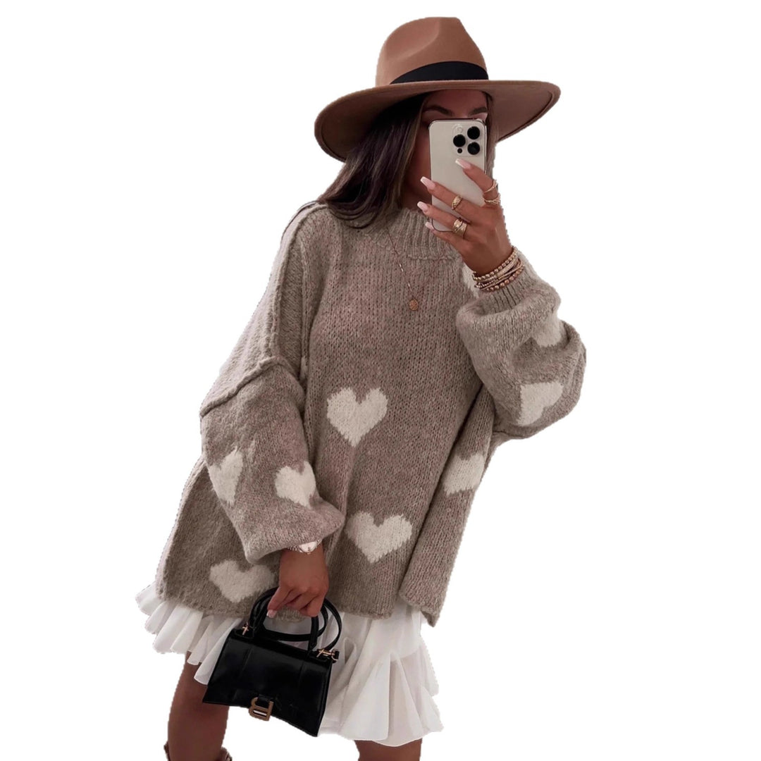 Kvindes moderigtige oversized sweater med hjerteformet mønster og voluminøse ærmer Stilla