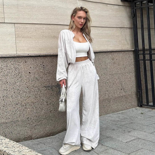Kvindernes sporty loungewear jakke med lynlås og trendy bredskårne bukser Skovae