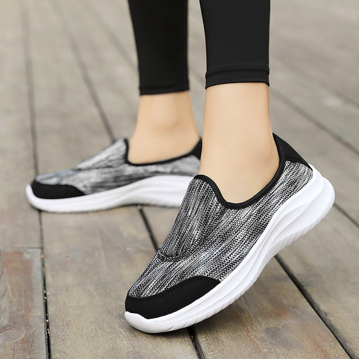 Dame nan elegant slip-on sneakers med elastiske dekorbånd, åndbar strikkonstruktion og dæmpet komfortsål Skovae