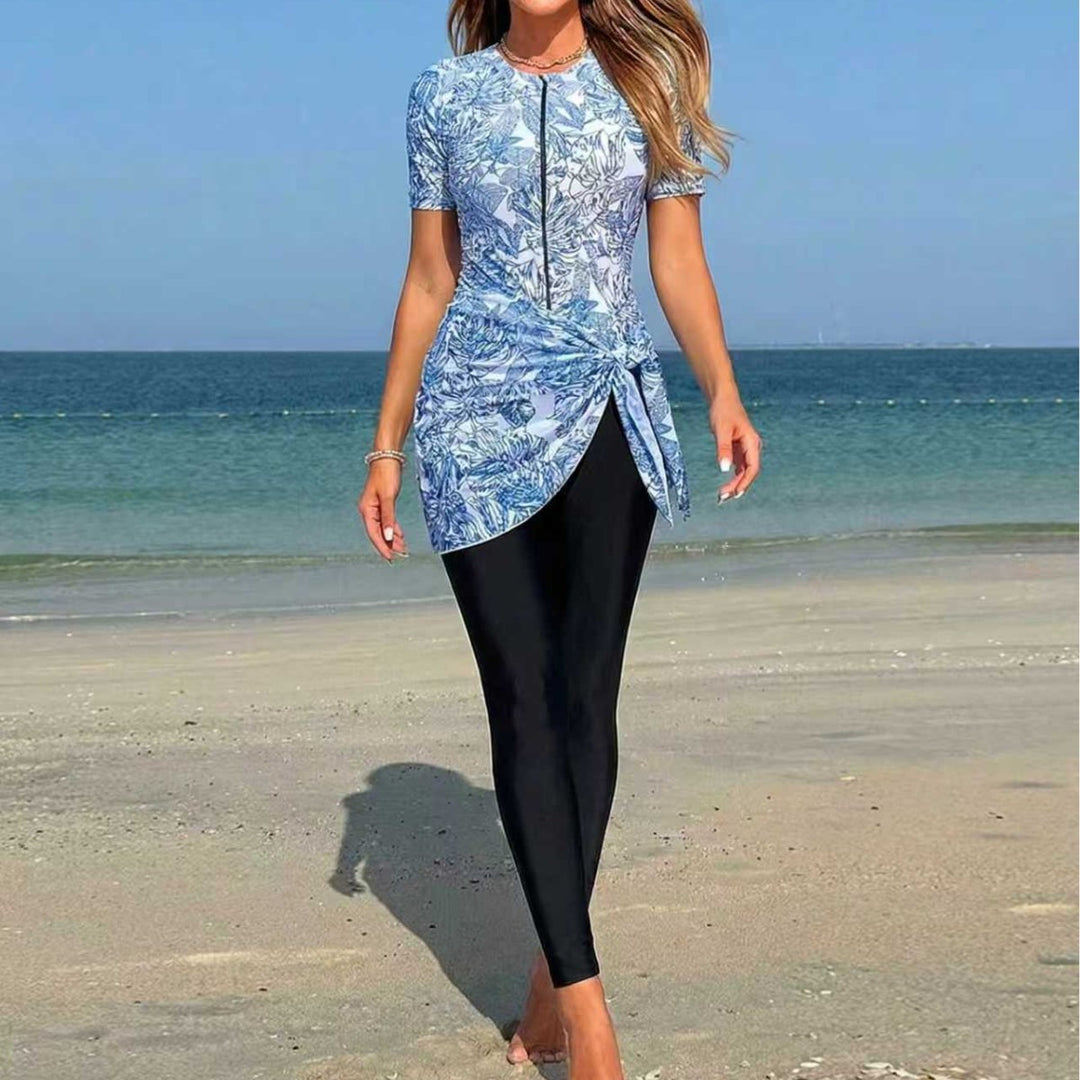 Damer sporty surfdragt med asymmetrisk snit og vildledetail Skovae