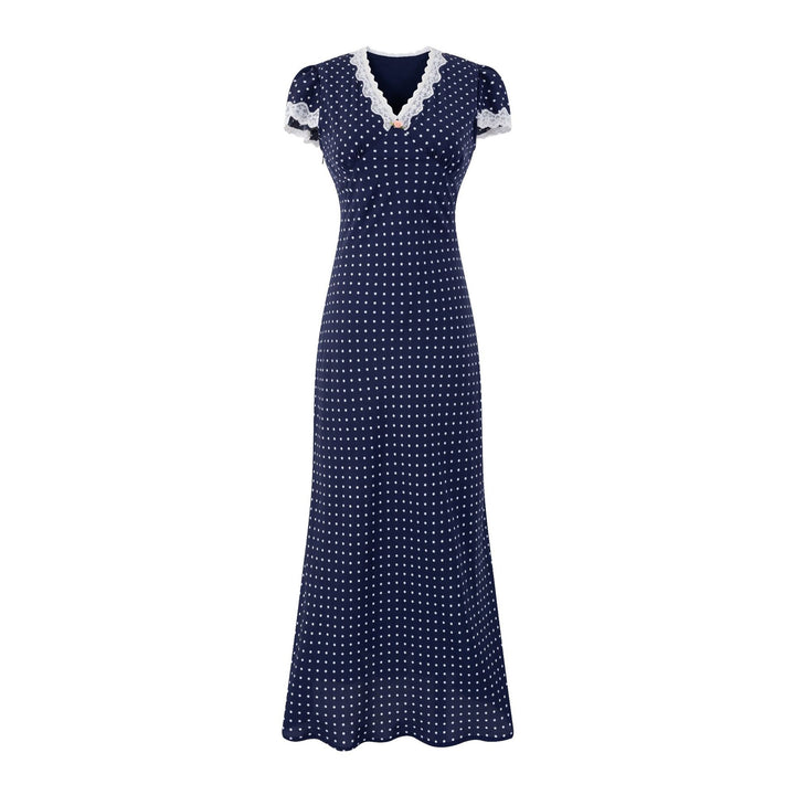 Dame Maxikjole med elegant spidsbort og legende polka-dot mønster Stilla