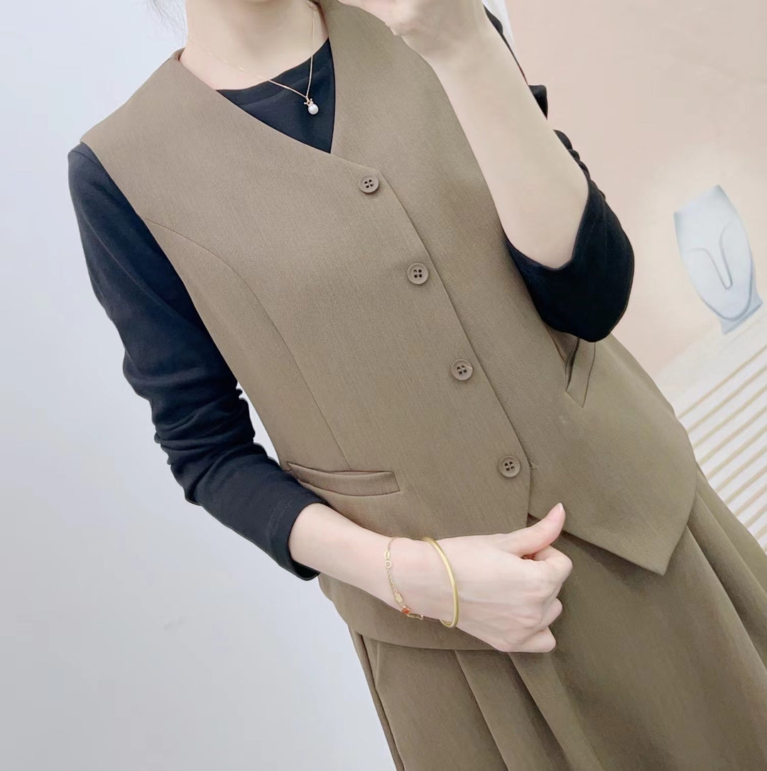 Dame elegant jumpsuit med ærmeløs vest og smart nederdel Stilla