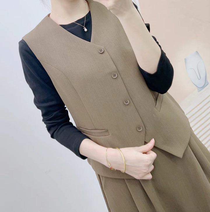 Dame elegant jumpsuit med ærmeløs vest og smart nederdel Stilla