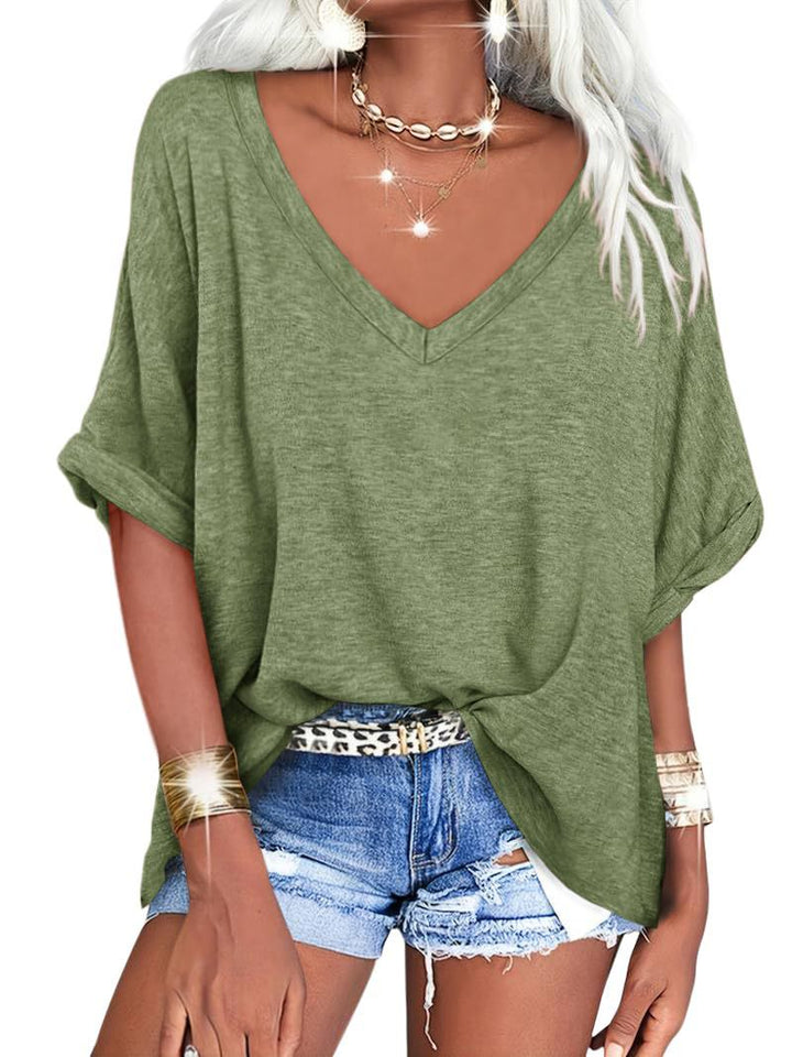 Dame afslappet V-hals T-shirt med oversized snit og plisseret detalje Stilla